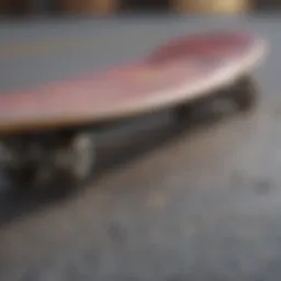 Close-up of skateboard deck showcasing grip tape and design