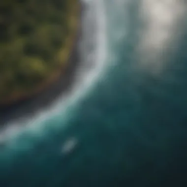 Aerial view of the diverse surf spots along the Kona coastline, showcasing the ocean currents.