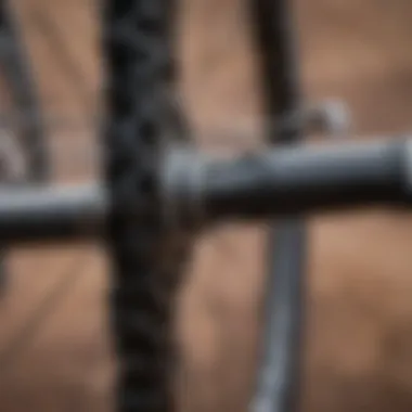 Close-up of a mountain bike chain being lubricated