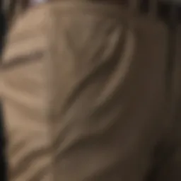 Detailed view of the elastic waistband feature in khaki pants
