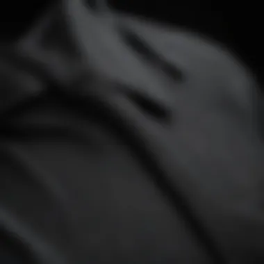 Quality Fabric of Black Long Sleeve Shirts Close-up of fabric texture showcasing the quality of a black long sleeve shirt