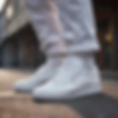 Casual styling with all white Reebok sneakers in urban setting