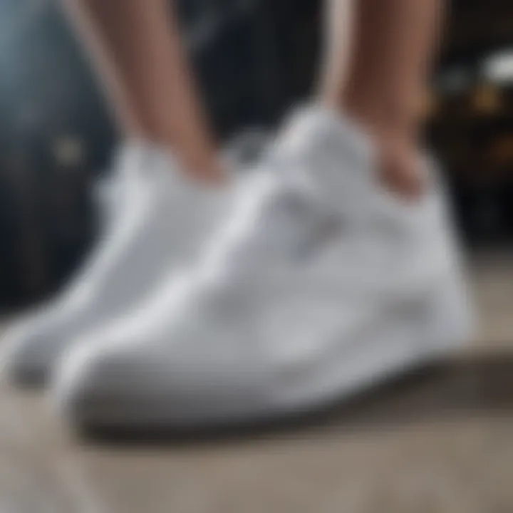 Close-up of performance features in all white Reebok shoes