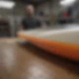 Surfboard manufacturing process showcasing craftsmanship