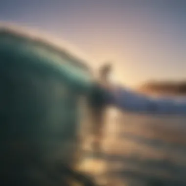 A surfer catching an impressive wave at sunset