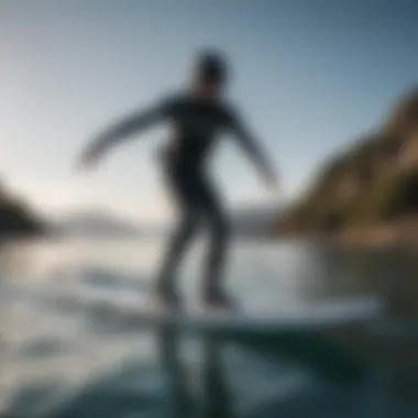 Experience the Thrill of Foil Boarding A sleek non-electric foil board gliding over crystal clear waters.