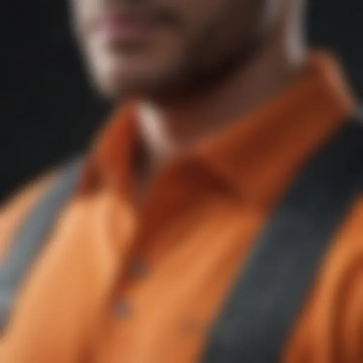 Close-up of an orange shirt showcasing advanced fabric technology