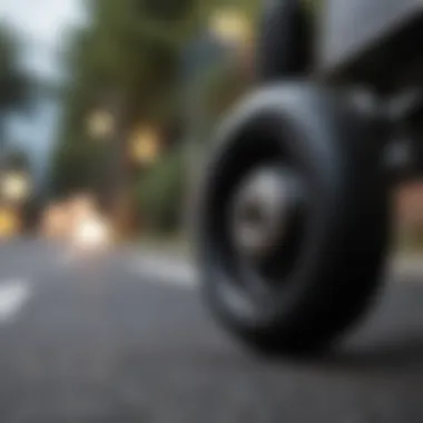 A black longboard wheel in action on a smooth road