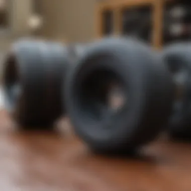 A well-maintained set of black longboard wheels with cleaning tools