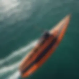 Aerial view of wing surf foiling on clear waters