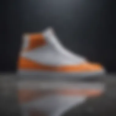 Elegant profile view of white and orange Nike Blazers