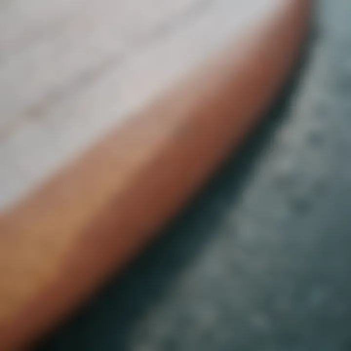 Close-up view of a surfboard's surface showcasing wear and tear