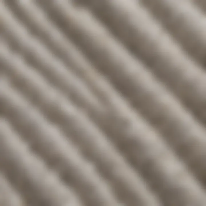 A close-up view of the fabric texture of the white True Religion sweater, showcasing its quality and craftsmanship.