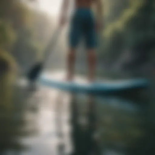 Paddle boarder demonstrating proper stance for balance