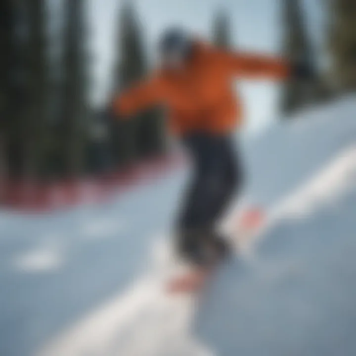 Snowboarder practicing jumps and tricks at a terrain park
