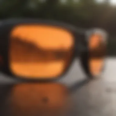 Close-up view of Oakley Gascan orange lenses reflecting sunlight