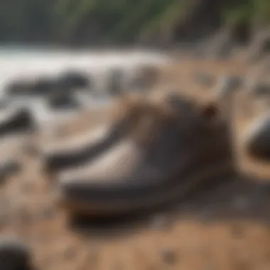 Stylish Olukai Hokua shoes on rocky beach