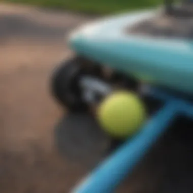 Close-up of paddle board securely mounted on a golf cart rack