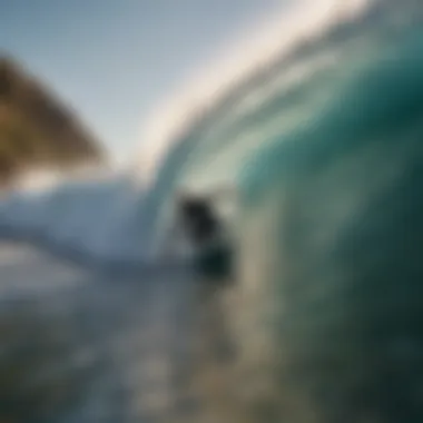 Surfer catching a wave at Barra de la Cruz