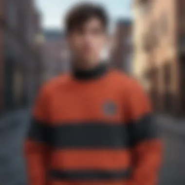 Stylish individual wearing The Hundreds sweater in an urban setting