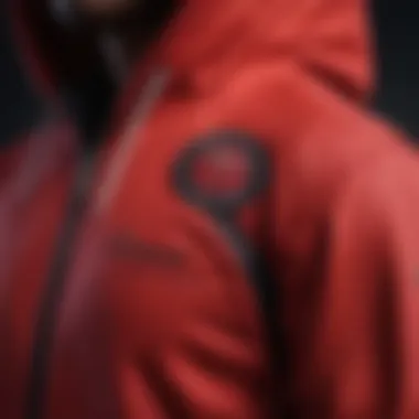 A close-up view of the fabric and stitching details of the red Champion hoodie