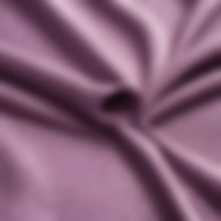 A close-up of the fabric of a light purple hoodie, highlighting material quality and design aspects suited for extreme activities.