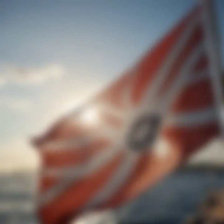 A close-up view of a national maritime flag waving proudly against the sky