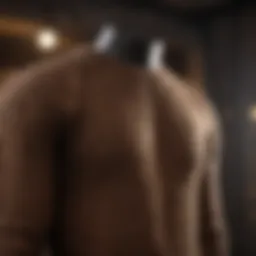 A stylish brown sweater displayed on a mannequin with textured fabric.