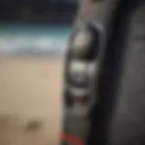 Detailed view of an FCS surf leash attachment