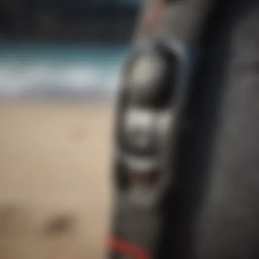 Detailed view of an FCS surf leash attachment