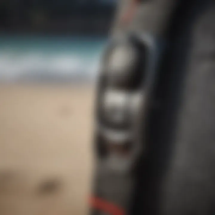 Detailed view of an FCS surf leash attachment